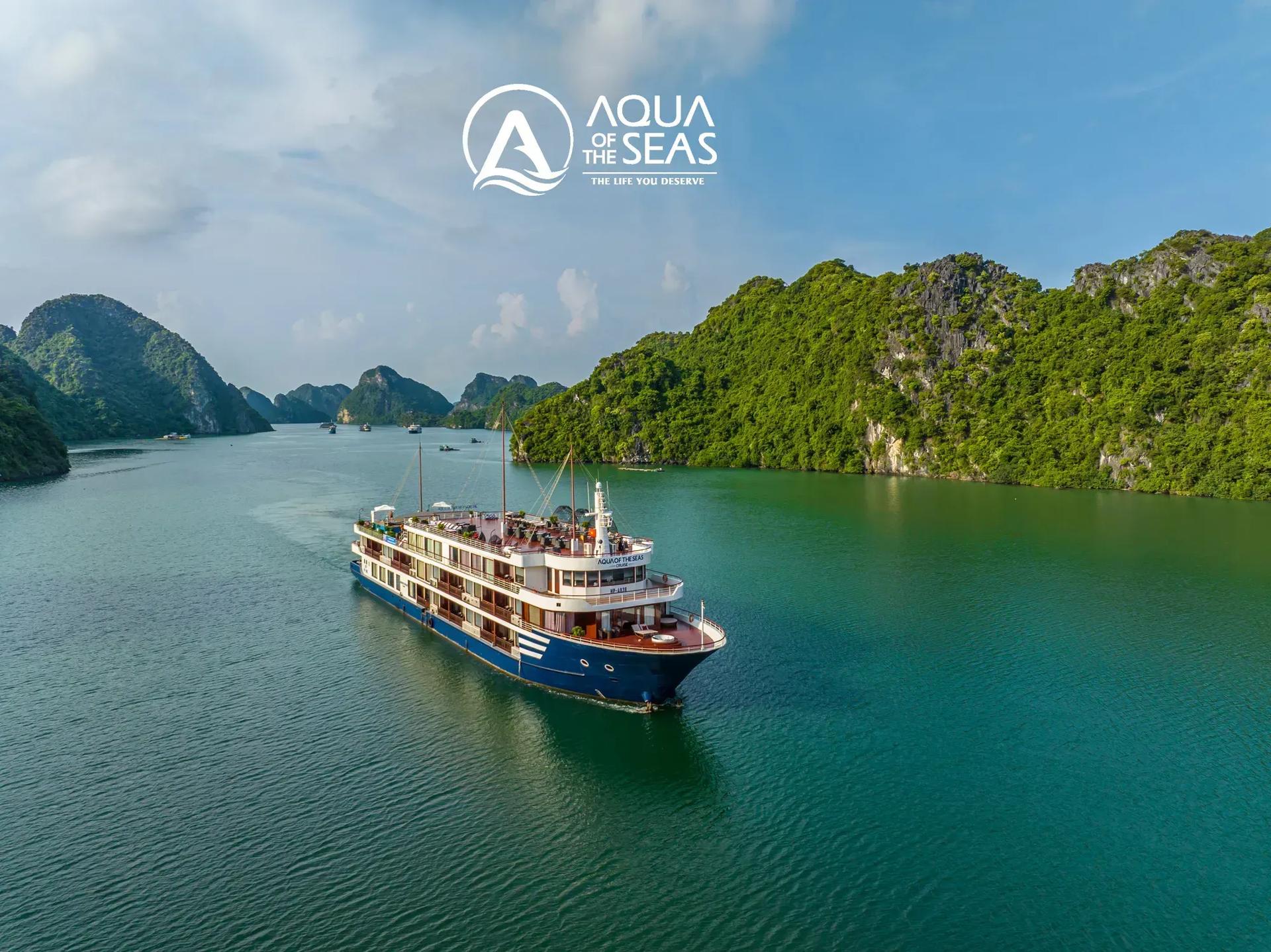 The luxurious Aqua Of The Seas cruise in Halong Bay, amidst majestic nature.