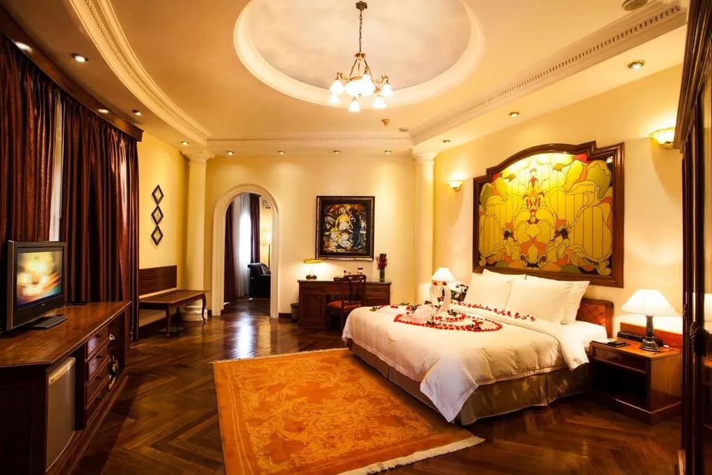 Guest rooms at Majestic Saigon offer elegant and cozy ambiance.