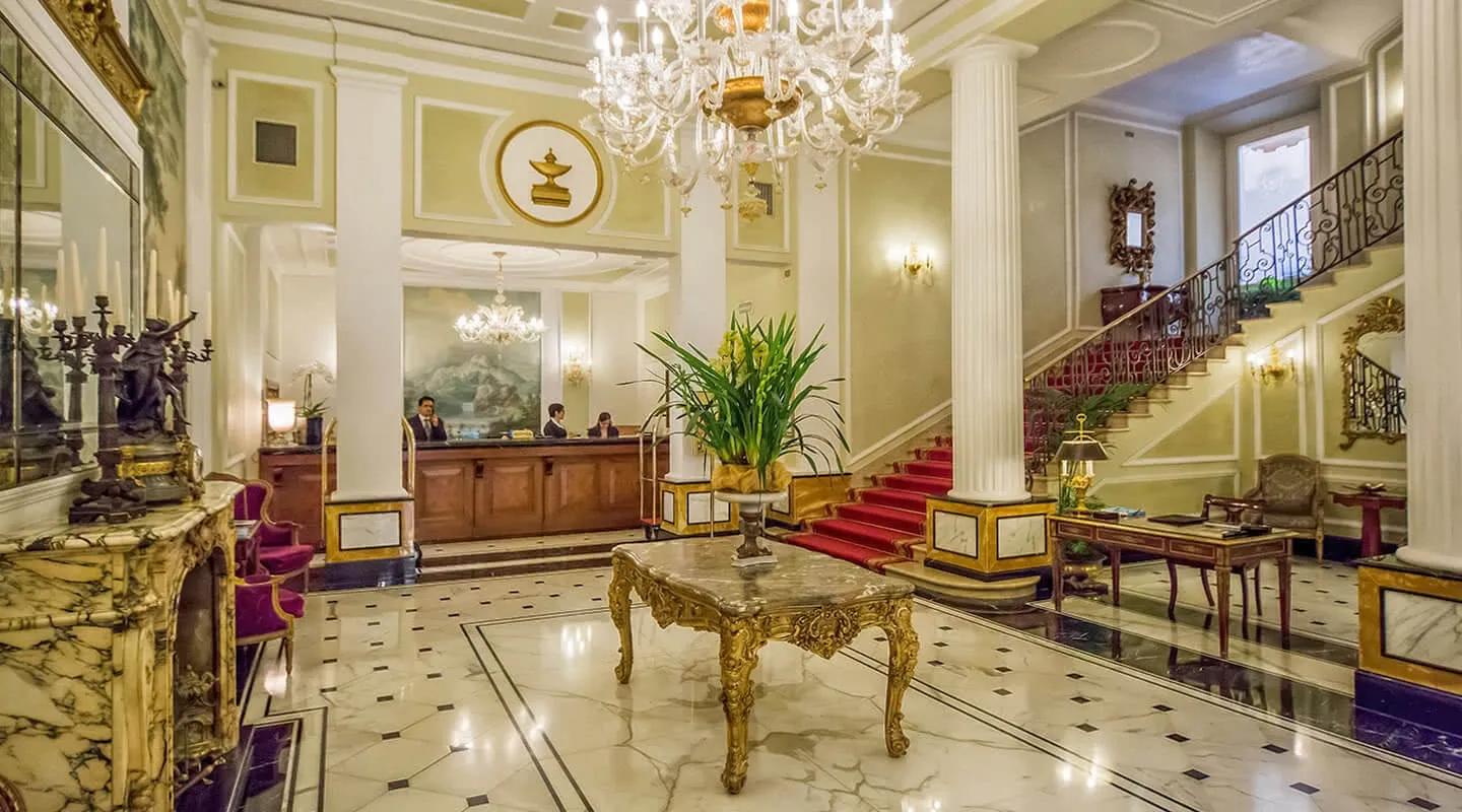 Majestic Saigon's lobby is elegant with chandeliers and sophisticated decor.