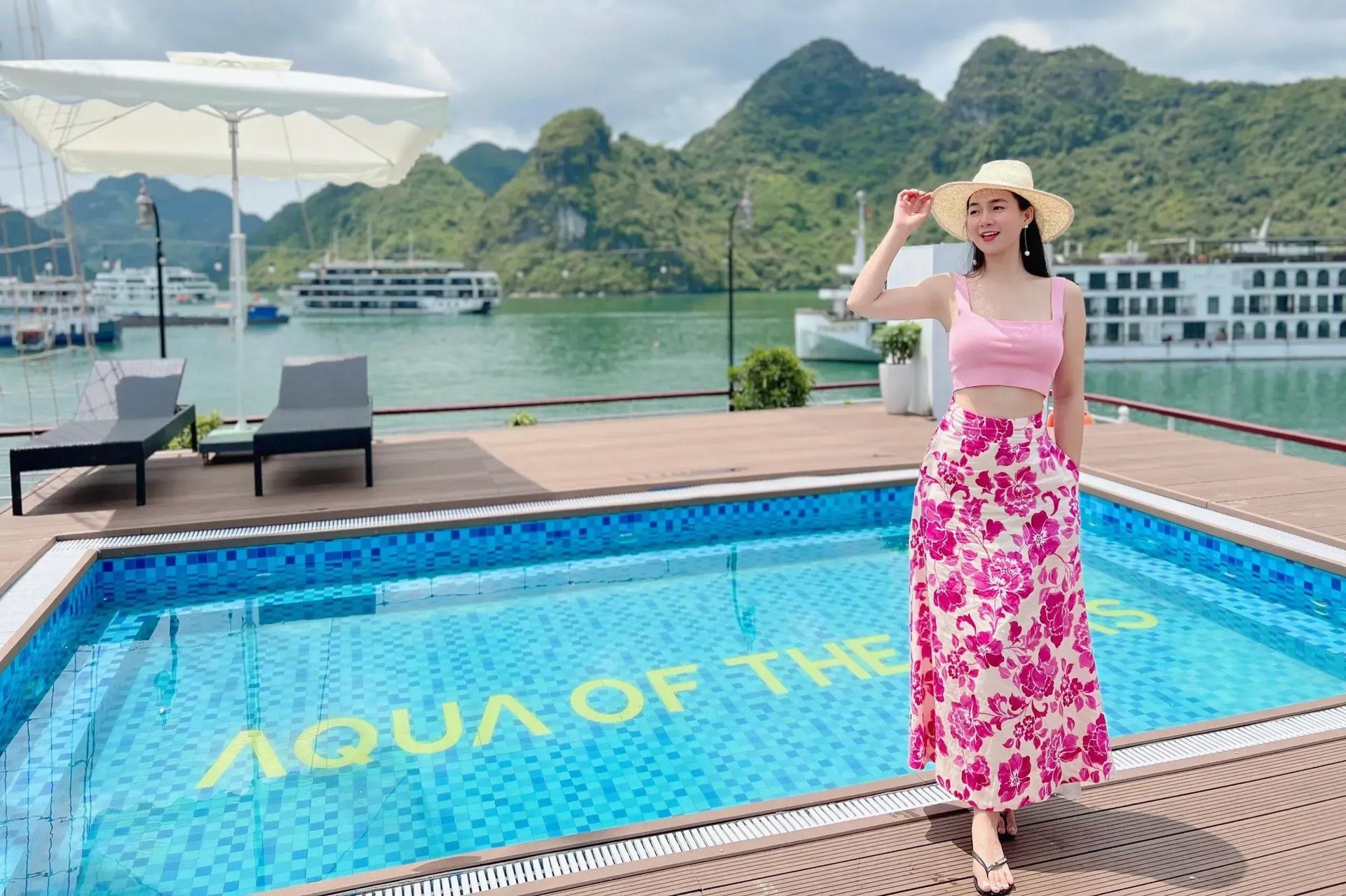 Relax by the outdoor pool on Aqua Of The Seas with majestic views.