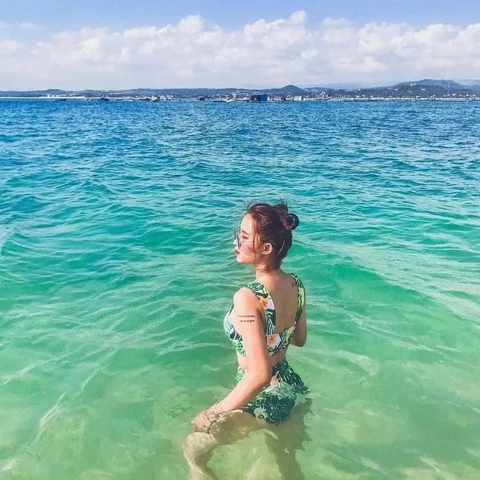 Immerse in the crystal-clear waters of Da Nang Beach.  