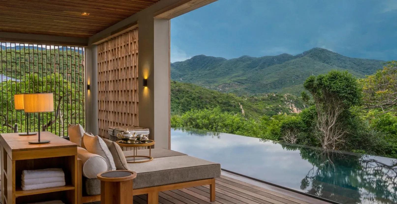 Luxurious room at Amanoi with a romantic mountain view.