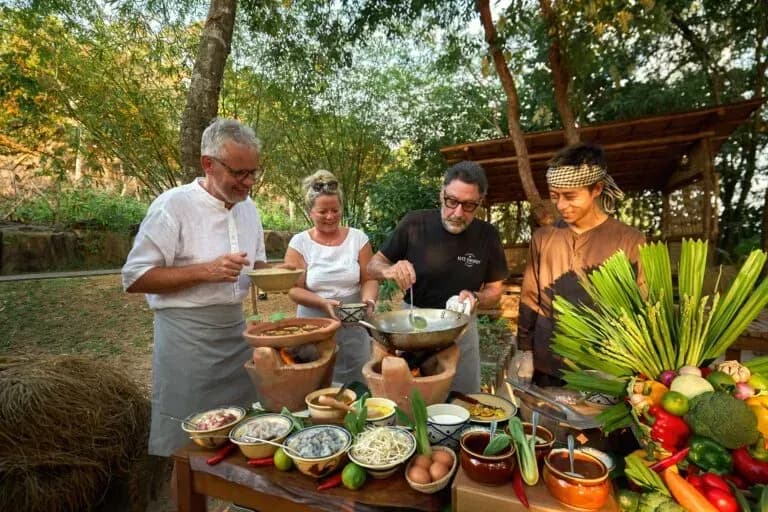Outdoor cooking class at Green Bay Phu Quoc, exploring local cuisine.