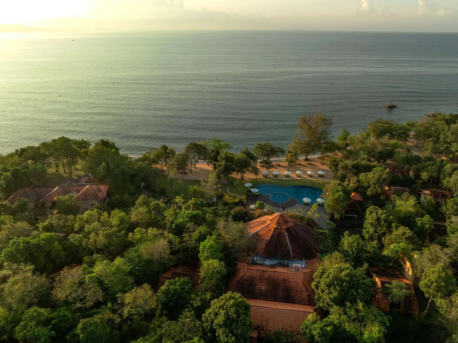 Overview of lush resort by Phu Quoc beach, blending with nature.