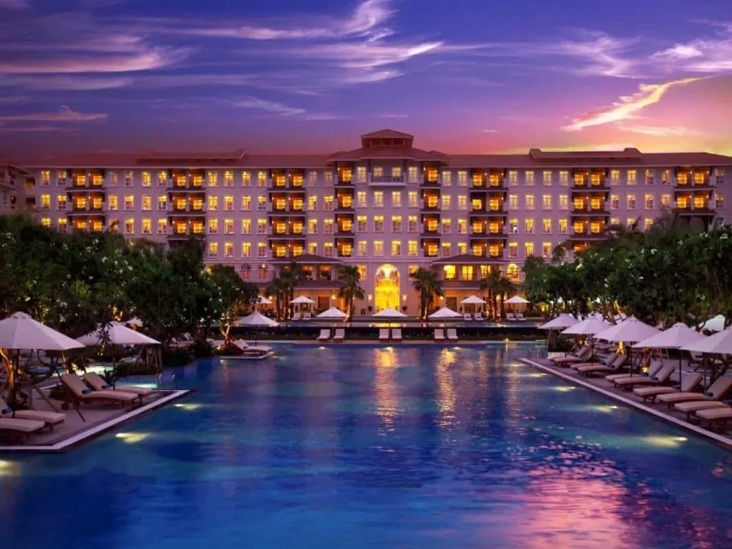 The stunning pool at Vinpearl Luxury Da Nang at sunset.