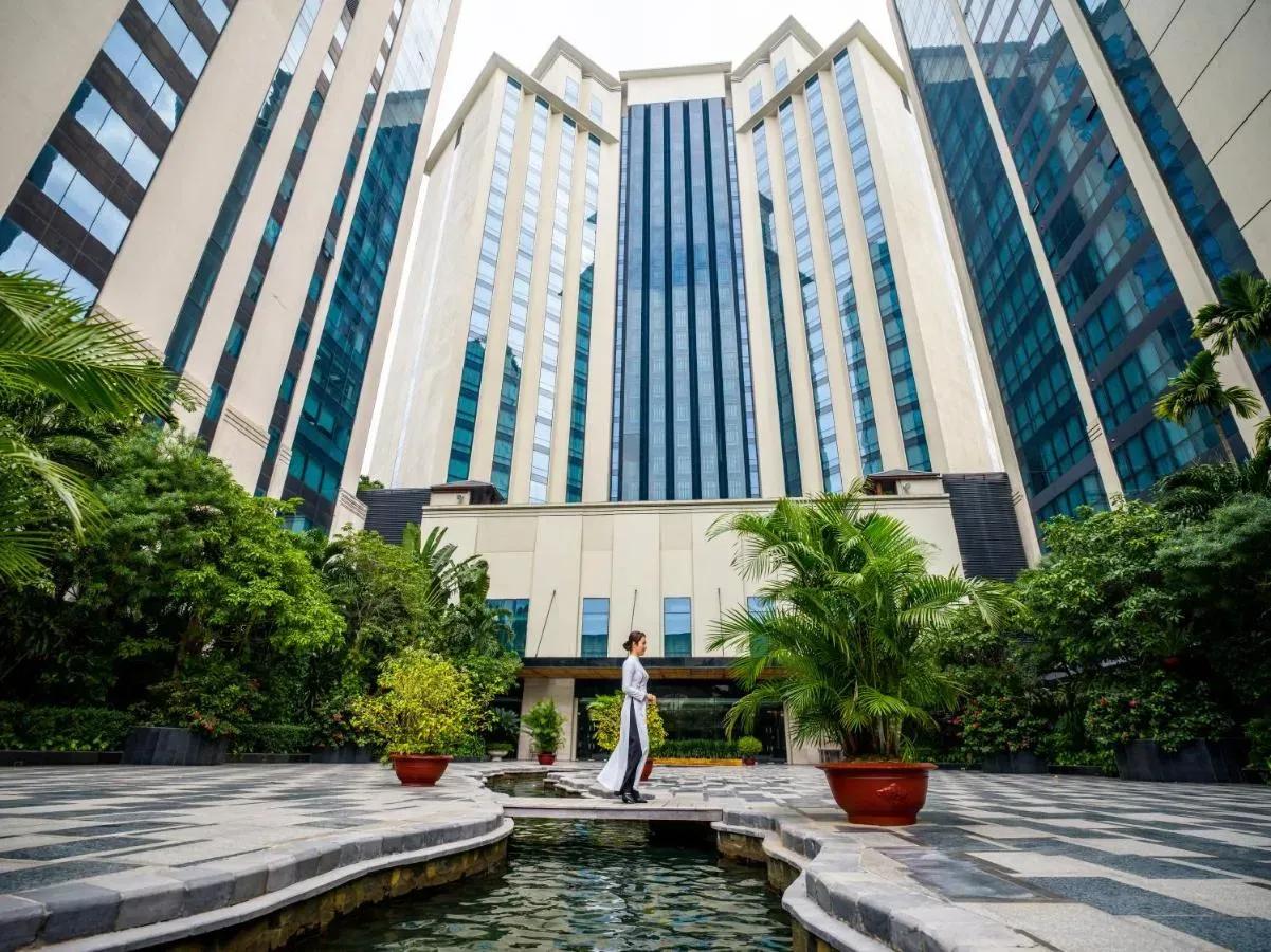Hyatt Regency West Hotel amidst lush greenery, creating a harmonious and serene space.
