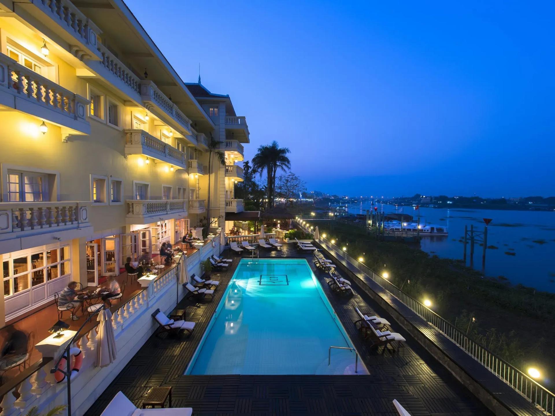 Stunning view of Victoria Chau Doc's pool at night, an ideal spot to unwind.