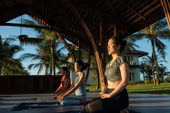 Serenity in yoga amid lush surroundings.