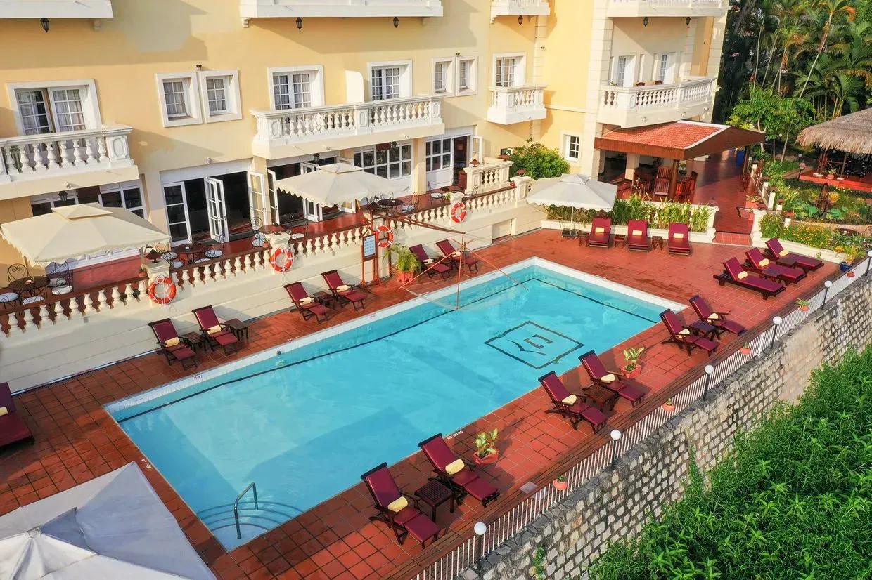 Victoria Chau Doc's pool offers relaxation under the Western sunlight.
