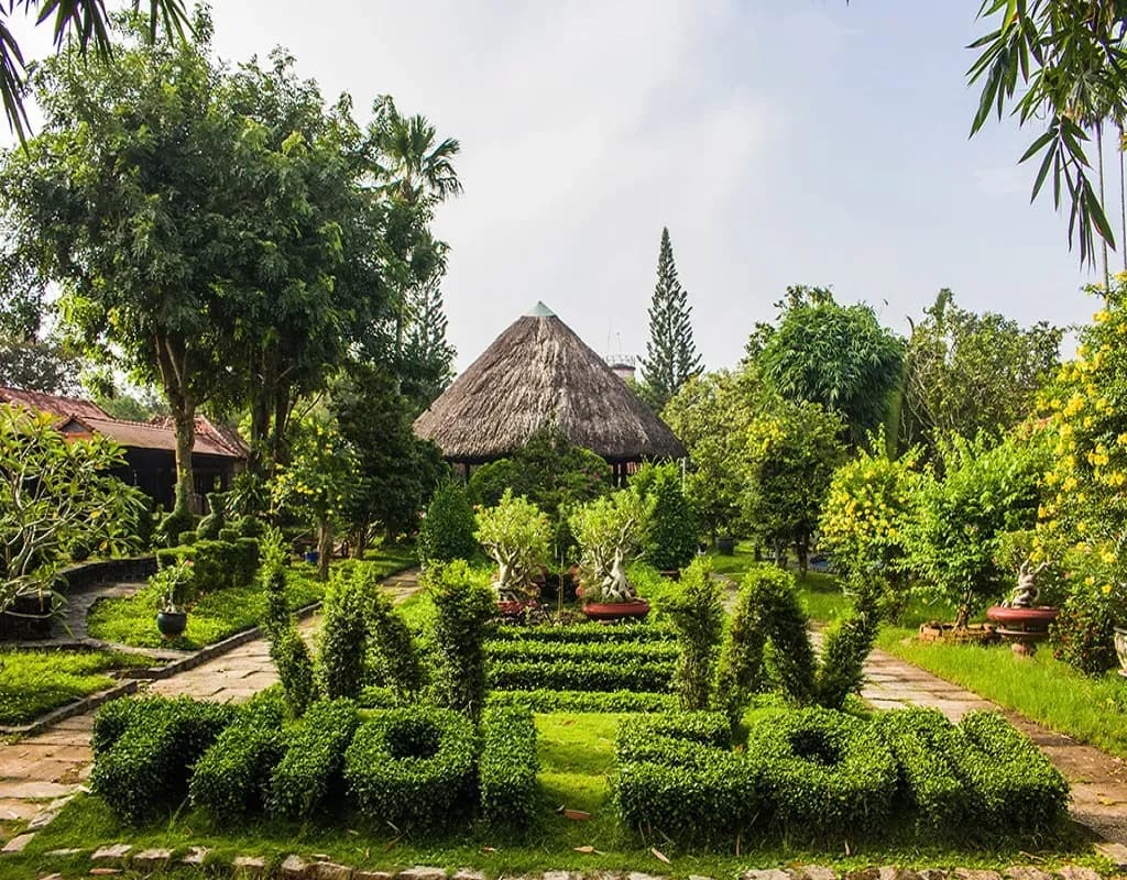 Tropical garden with harmonious traditional architecture.